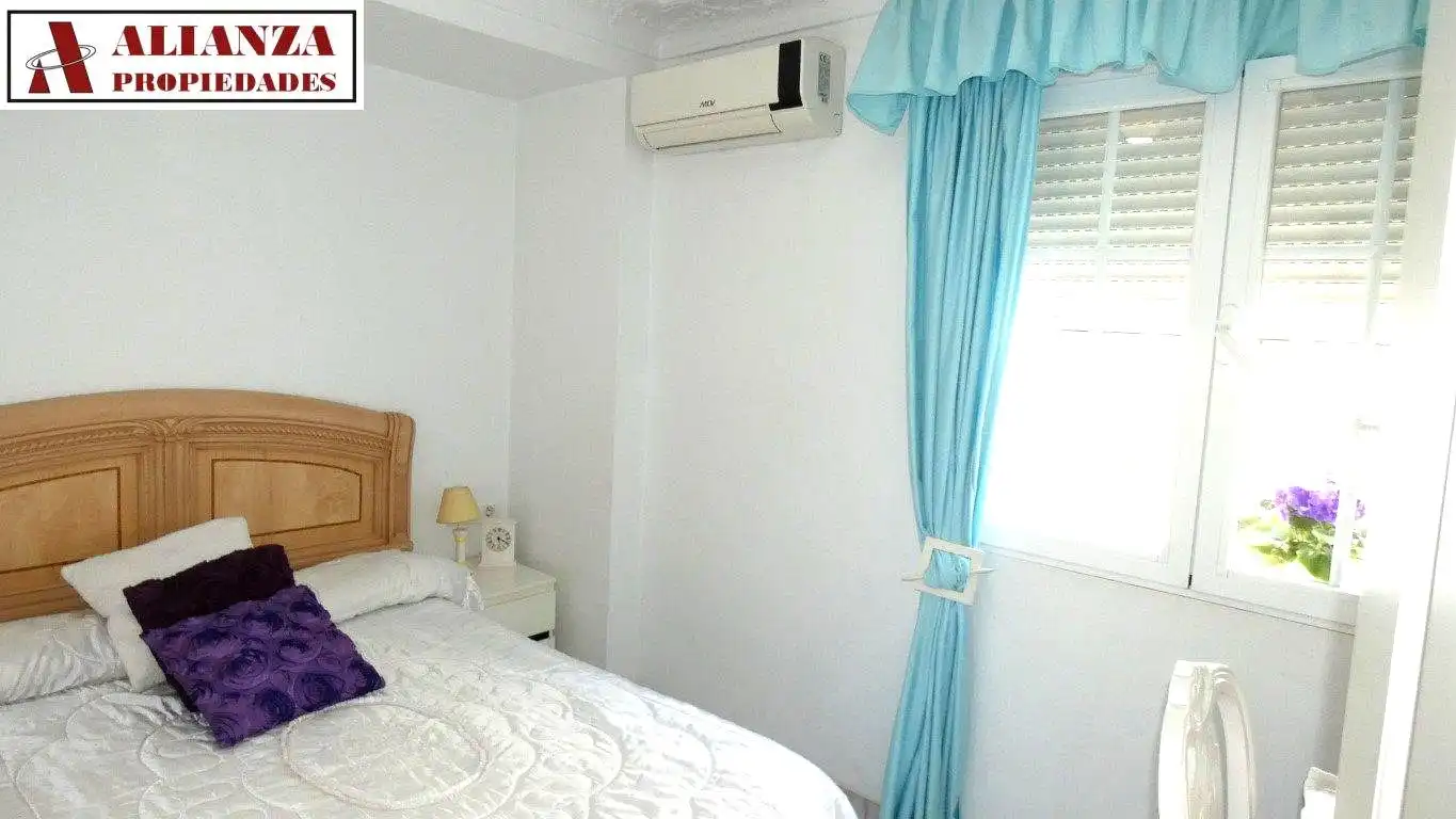 Bedroom of Flat for sale in Málaga  with Air Conditioner, Terrace and Furnished
