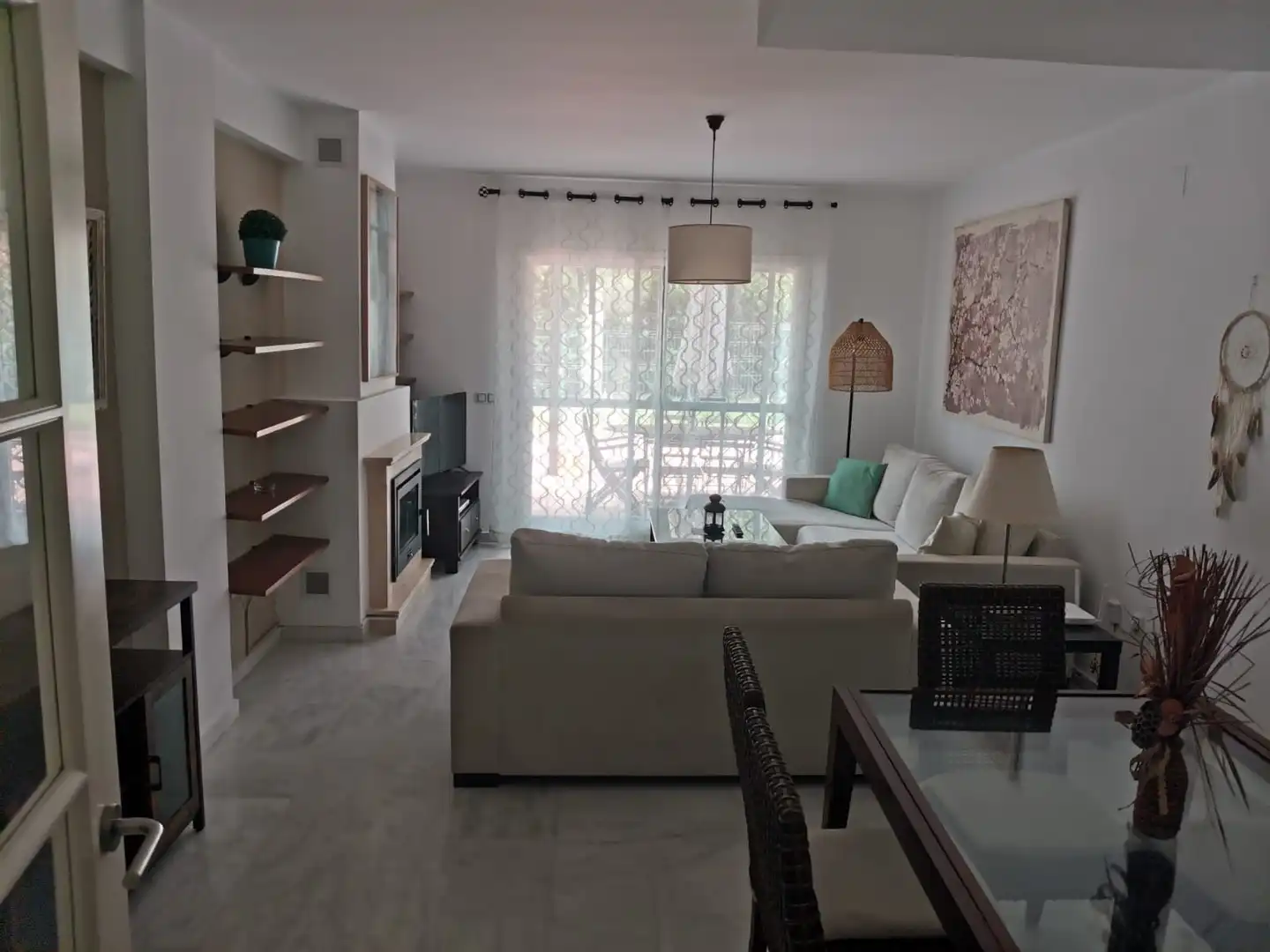 Sala d'estar de Casa adosada de lloguer en El Portil amb Aire condicionat, Terrassa i Moblat