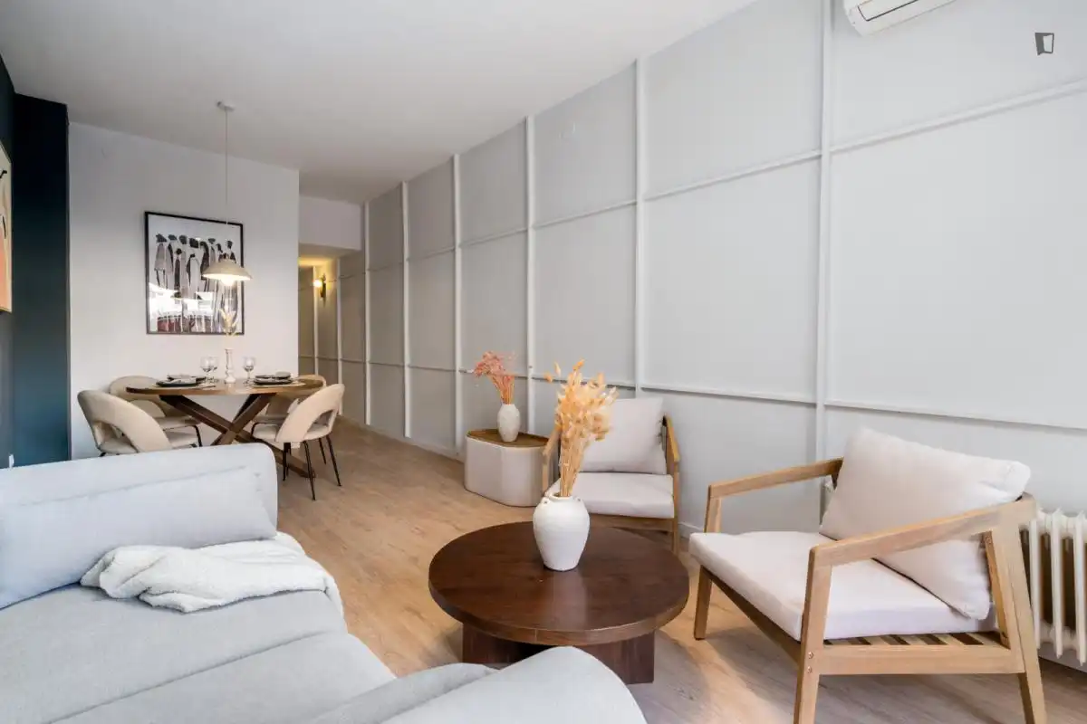 Sala de estar de Apartamento para compartir en Barcelona con Aire acondicionado, Calefacción y Amueblado