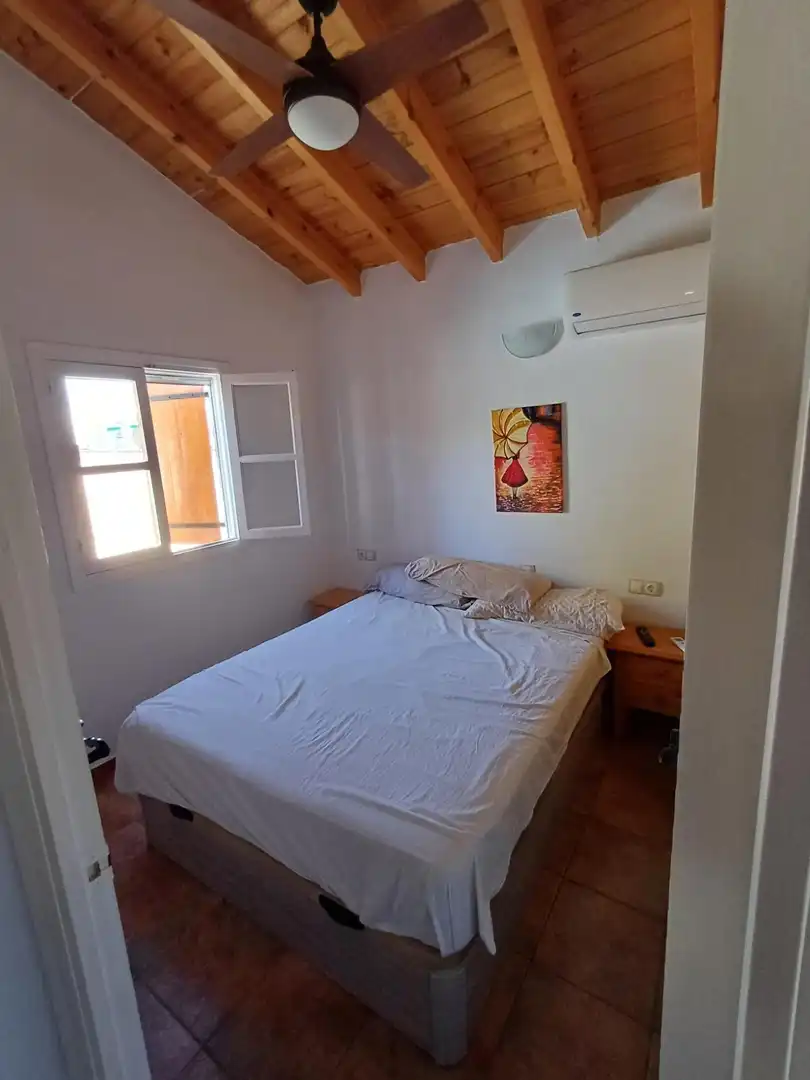 Dormitori de Casa o xalet de lloguer en Águilas amb Aire condicionat, Jardí privat i Piscina