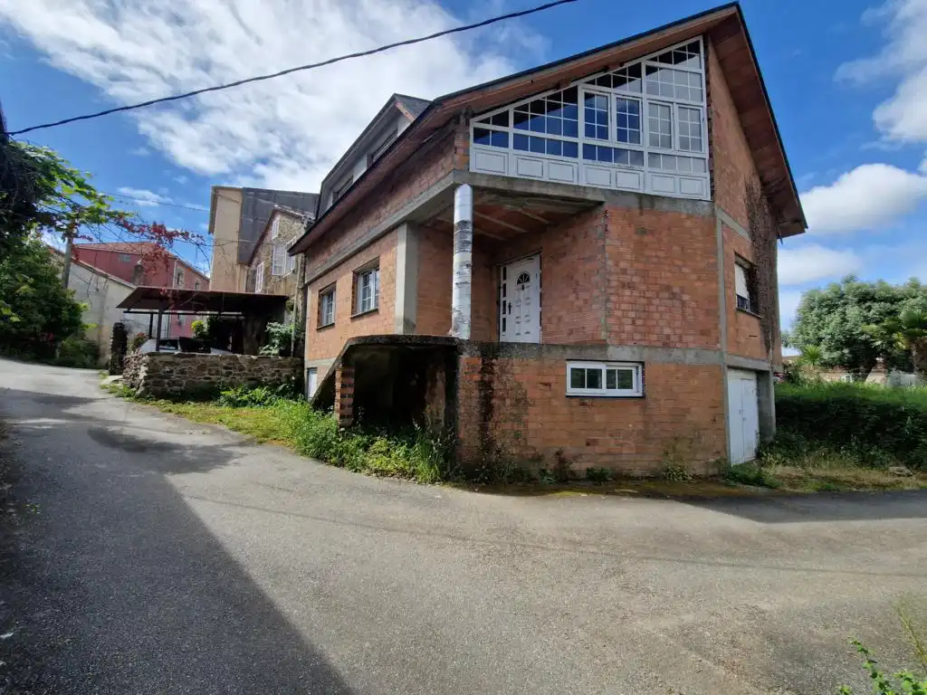 Vista exterior de Casa o xalet en venda en Rianxo amb Jardí privat, Traster i Balcó