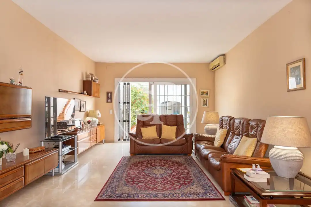 Sala d'estar de Casa adosada en venda en Sabadell amb Aire condicionat, Calefacció i Jardí privat