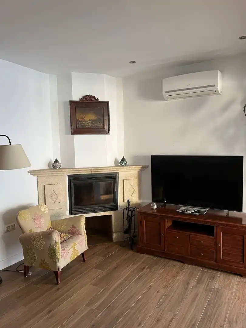 Sala d'estar de Casa adosada en venda en El Puerto de Santa María amb Aire condicionat, Jardí privat i Parquet