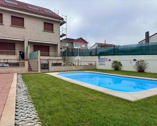 Swimming pool of Single-family semi-detached for sale in Sanxenxo  with Heating, Terrace and Storage room