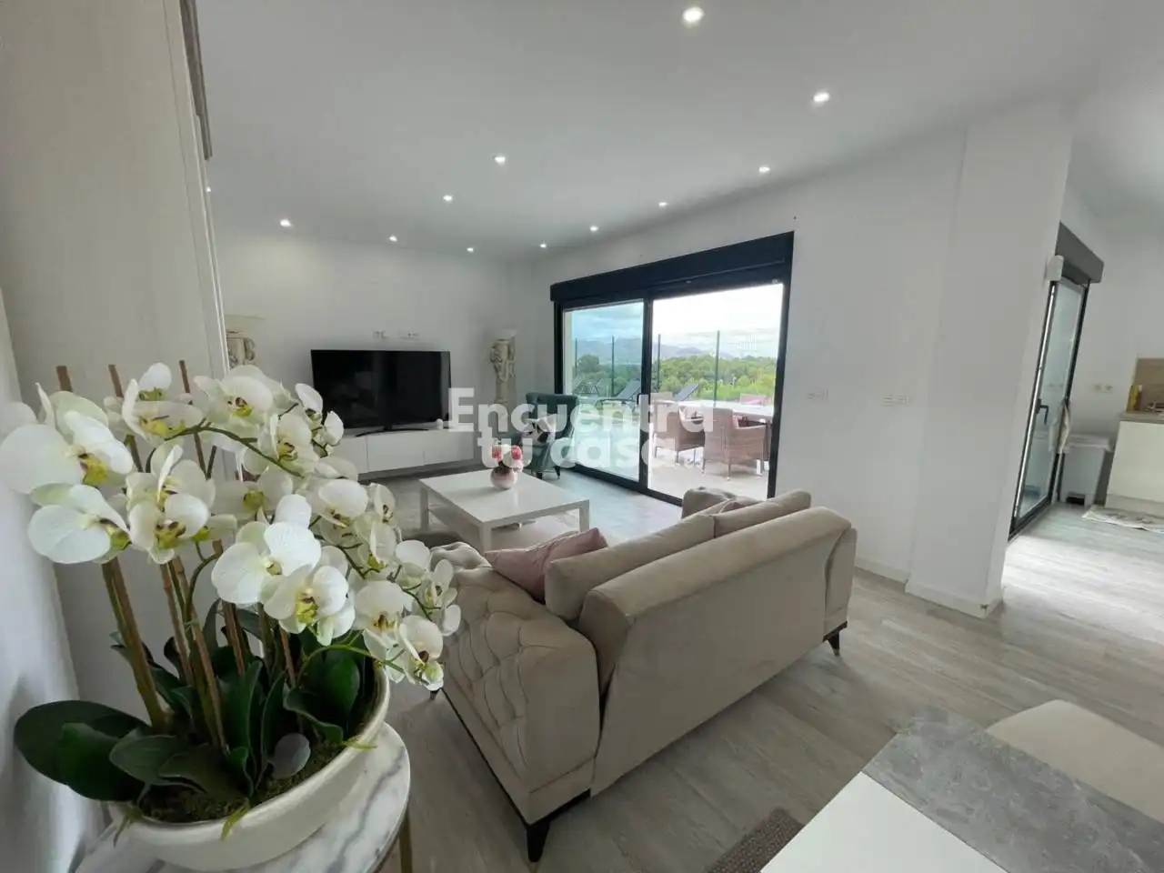 Sala d'estar de Casa o xalet en venda en L'Alfàs del Pi amb Aire condicionat, Calefacció i Jardí privat