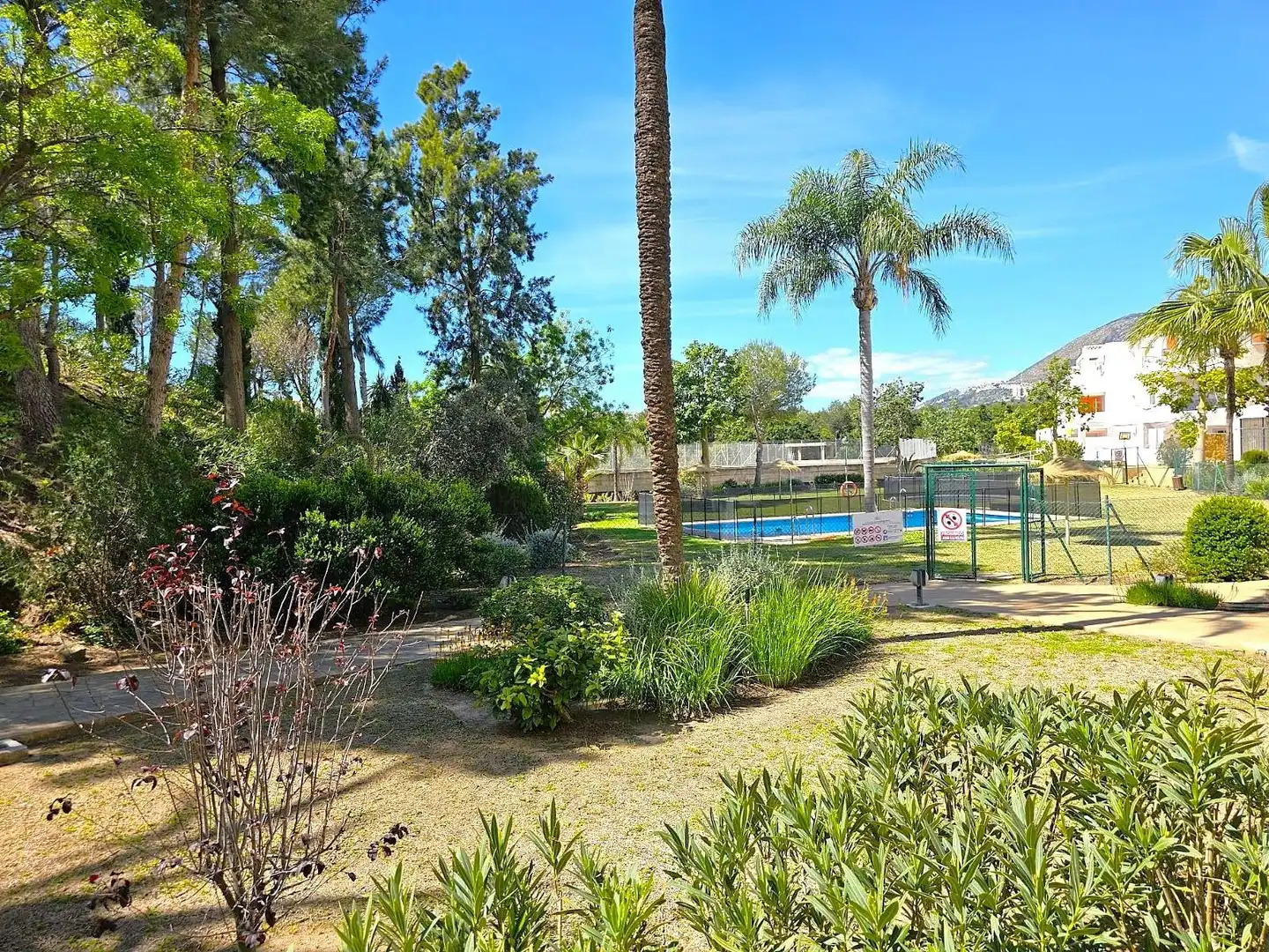 Swimming pool of Flat for sale in Benalmádena  with Air Conditioner, Heating and Private garden