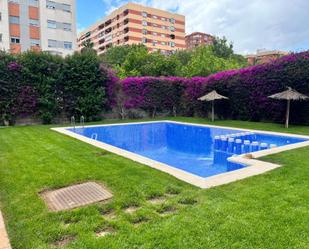 Swimming pool of Flat to rent in  Valencia Capital  with Air Conditioner, Heating and Private garden