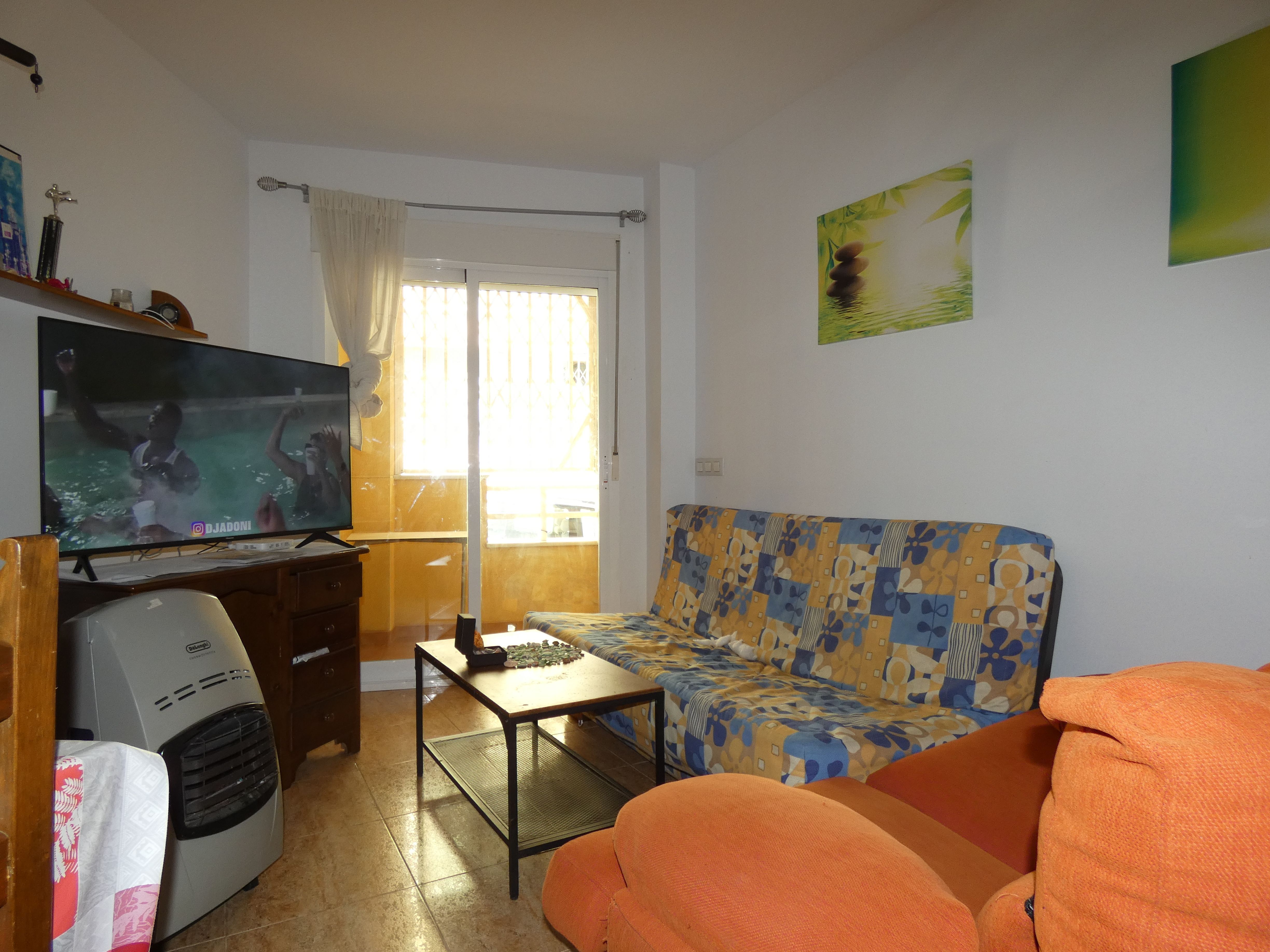 Living room of Flat for sale in Garrucha  with Terrace, Storage room and Oven
