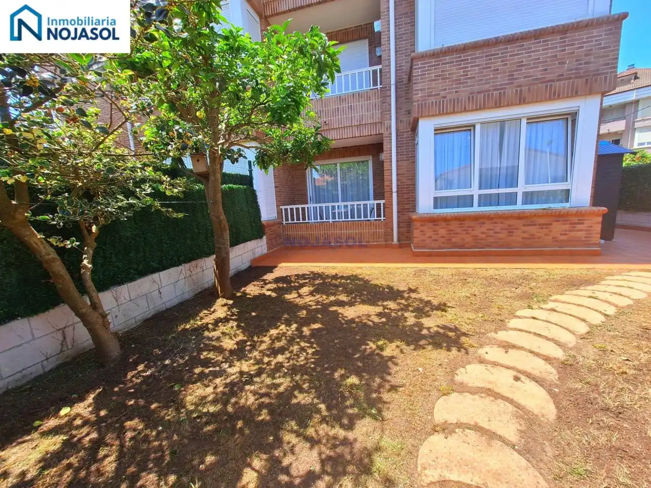 Jardí de Apartament de lloguer en Noja amb Calefacció, Jardí privat i Terrassa