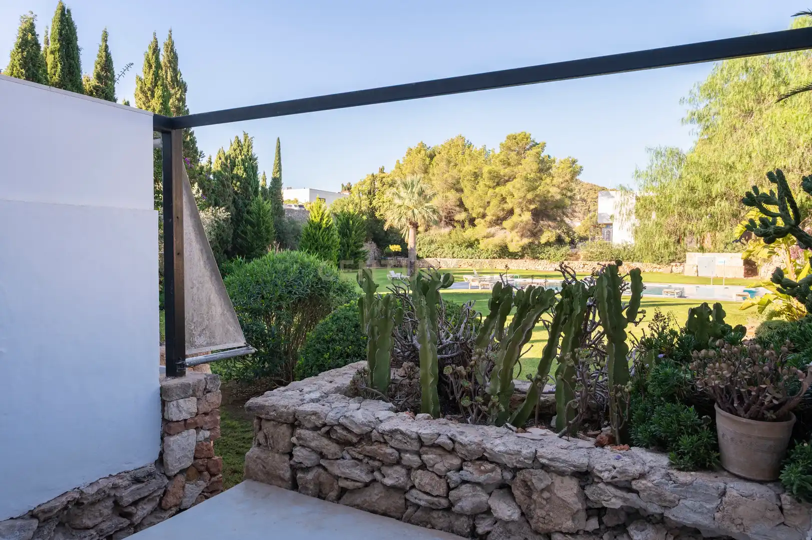 Terraza de Apartamento de alquiler en Santa Eulària des Riu con Aire acondicionado, Jardín privado y Piscina comunitaria