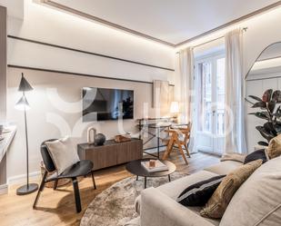 Sala d'estar de Apartament de lloguer en  Madrid Capital amb Aire condicionat