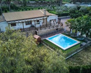 Swimming pool of House or chalet for sale in Aznalcázar  with Air Conditioner, Heating and Private garden