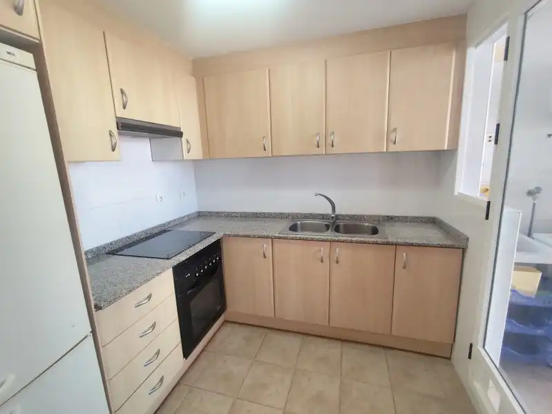 Cuina de Apartament en venda en Cullera amb Aire condicionat, Terrassa i Moblat