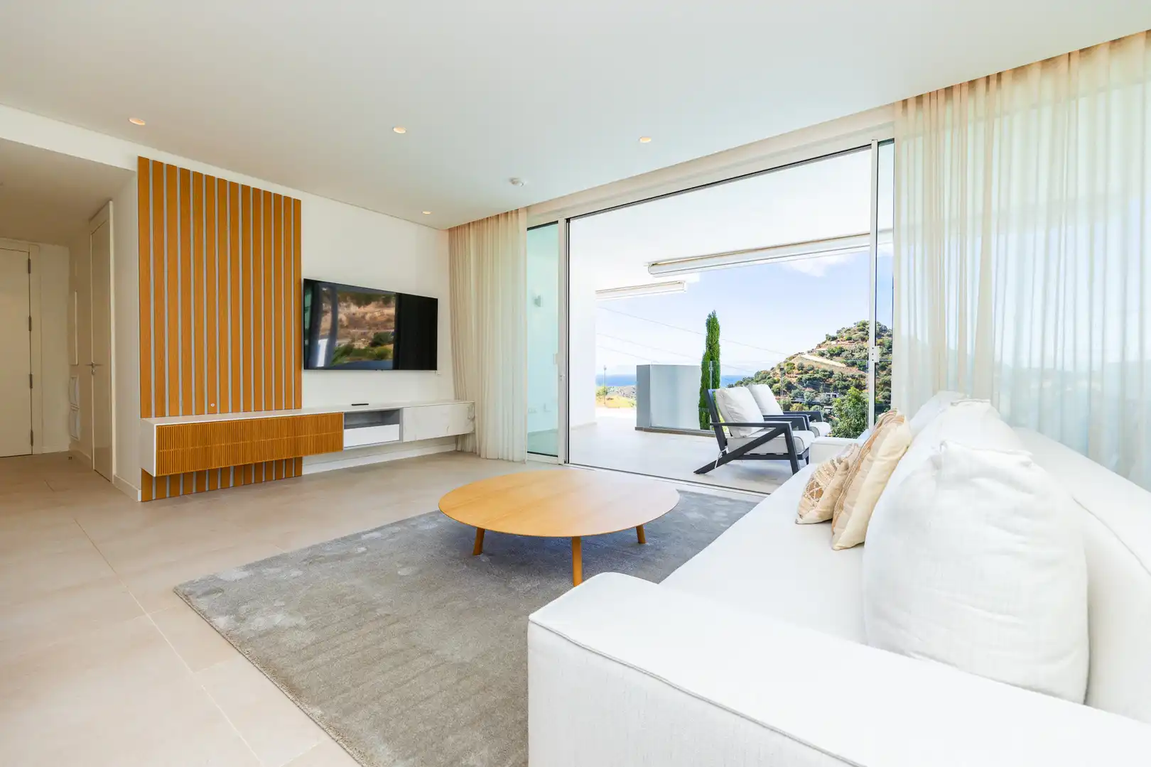 Sala de estar de Planta baja en venta en Ojén con Aire acondicionado, Terraza y Piscina