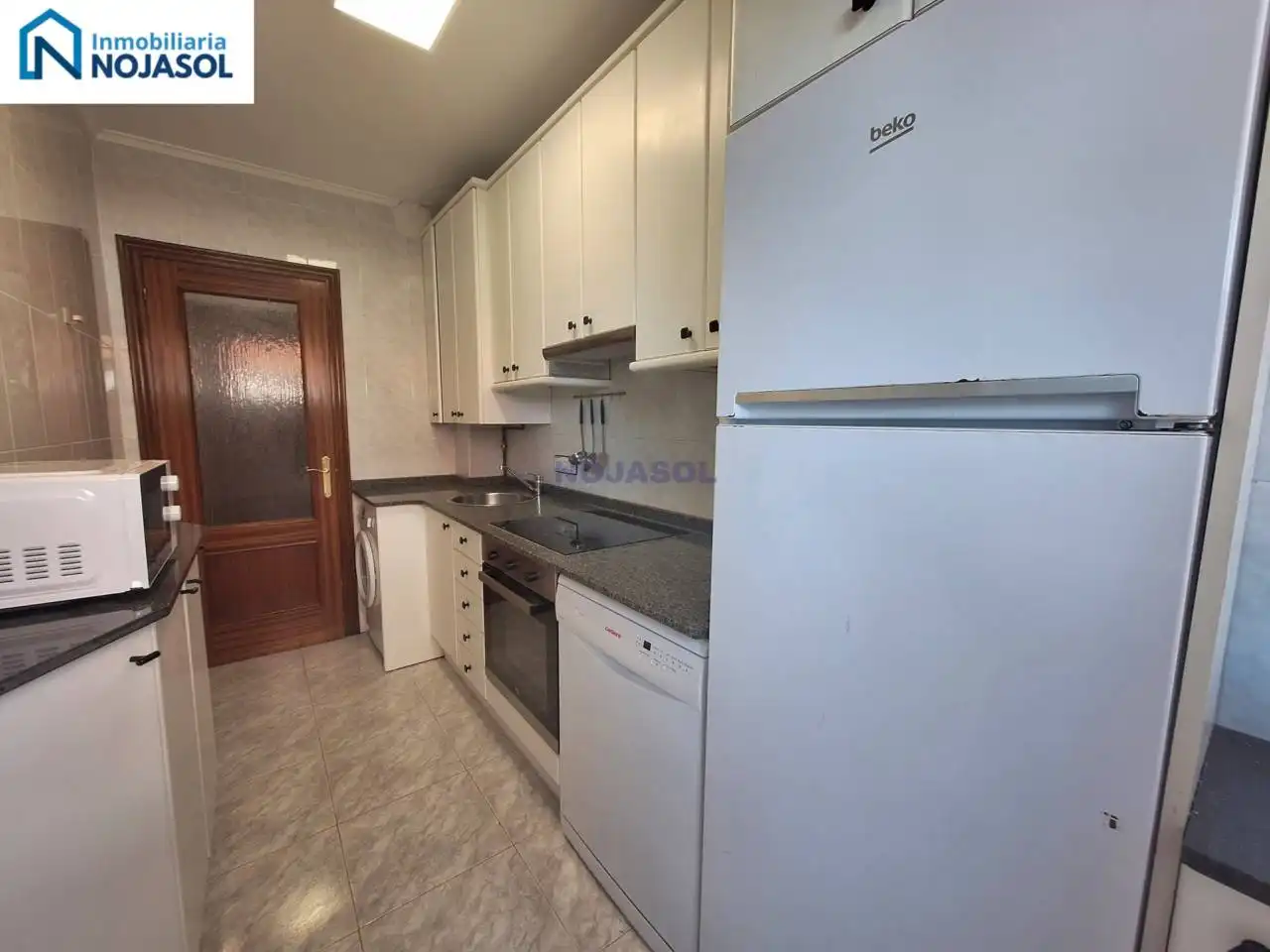 Cuina de Apartament de lloguer en Noja amb Calefacció, Jardí privat i Terrassa