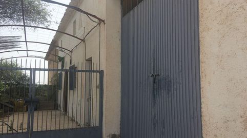 TERRENO CON CASA  Y NAVES
