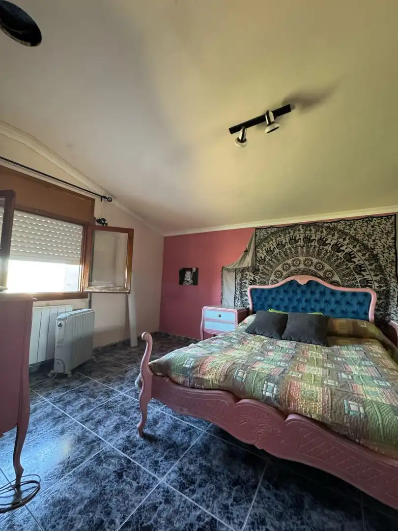Dormitori de Casa adosada en venda en Alcañiz amb Terrassa, Traster i Piscina comunitària