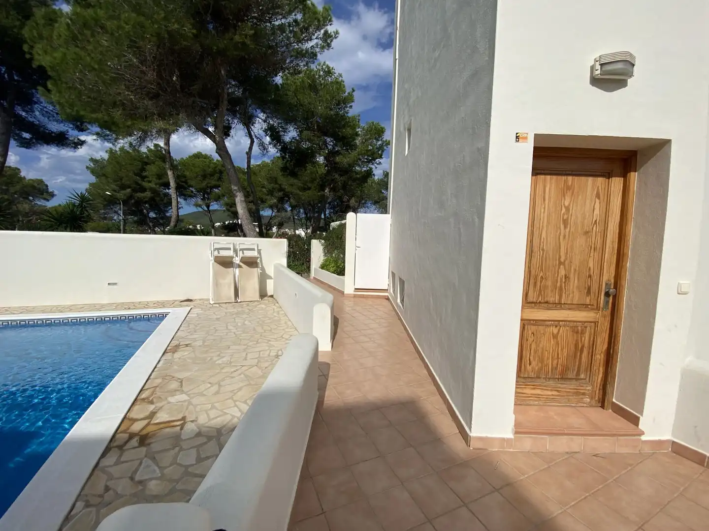 Piscina de Casa adosada en venta en Santa Eulària des Riu con Aire acondicionado, Calefacción y Jardín privado