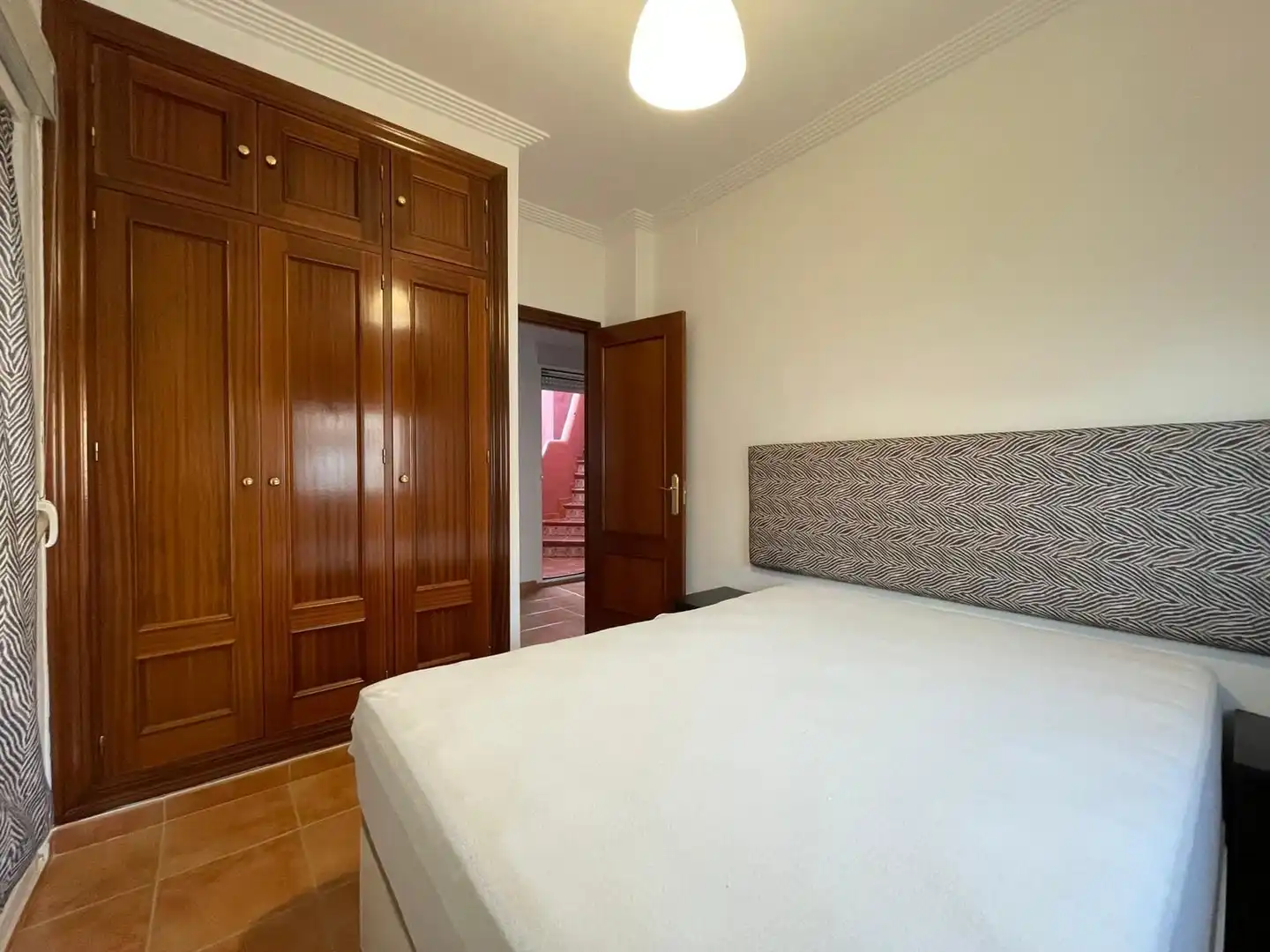 Habitación de Casa o chalet de alquiler en El Portil con Piscina comunitaria