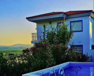 Vista exterior de Casa o xalet en venda en Torrent amb Jardí privat, Terrassa i Piscina