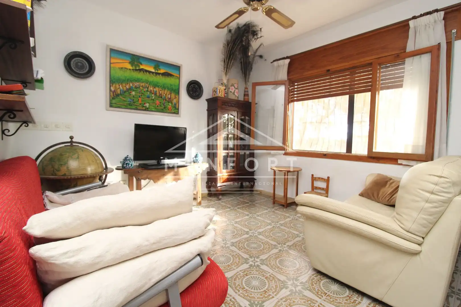 Sala d'estar de Casa o xalet en venda en Pilar de la Horadada amb Jardí privat, Terrassa i Traster