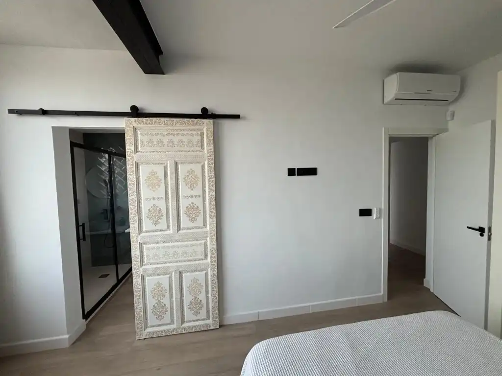 Dormitori de Casa adosada de lloguer en Vélez-Málaga amb Aire condicionat