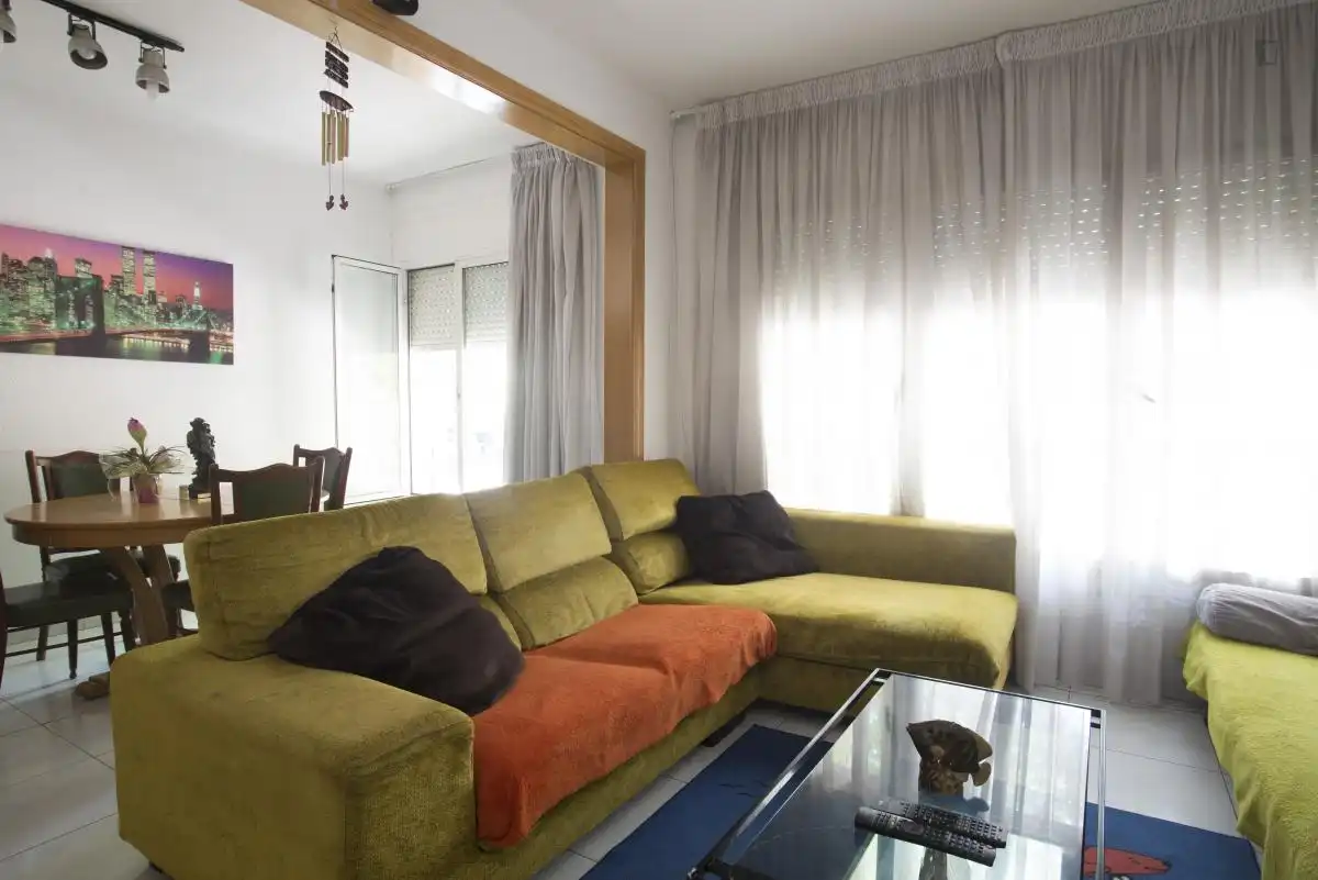 Sala de estar de Apartamento para compartir en Barcelona con Aire acondicionado, Calefacción y Amueblado