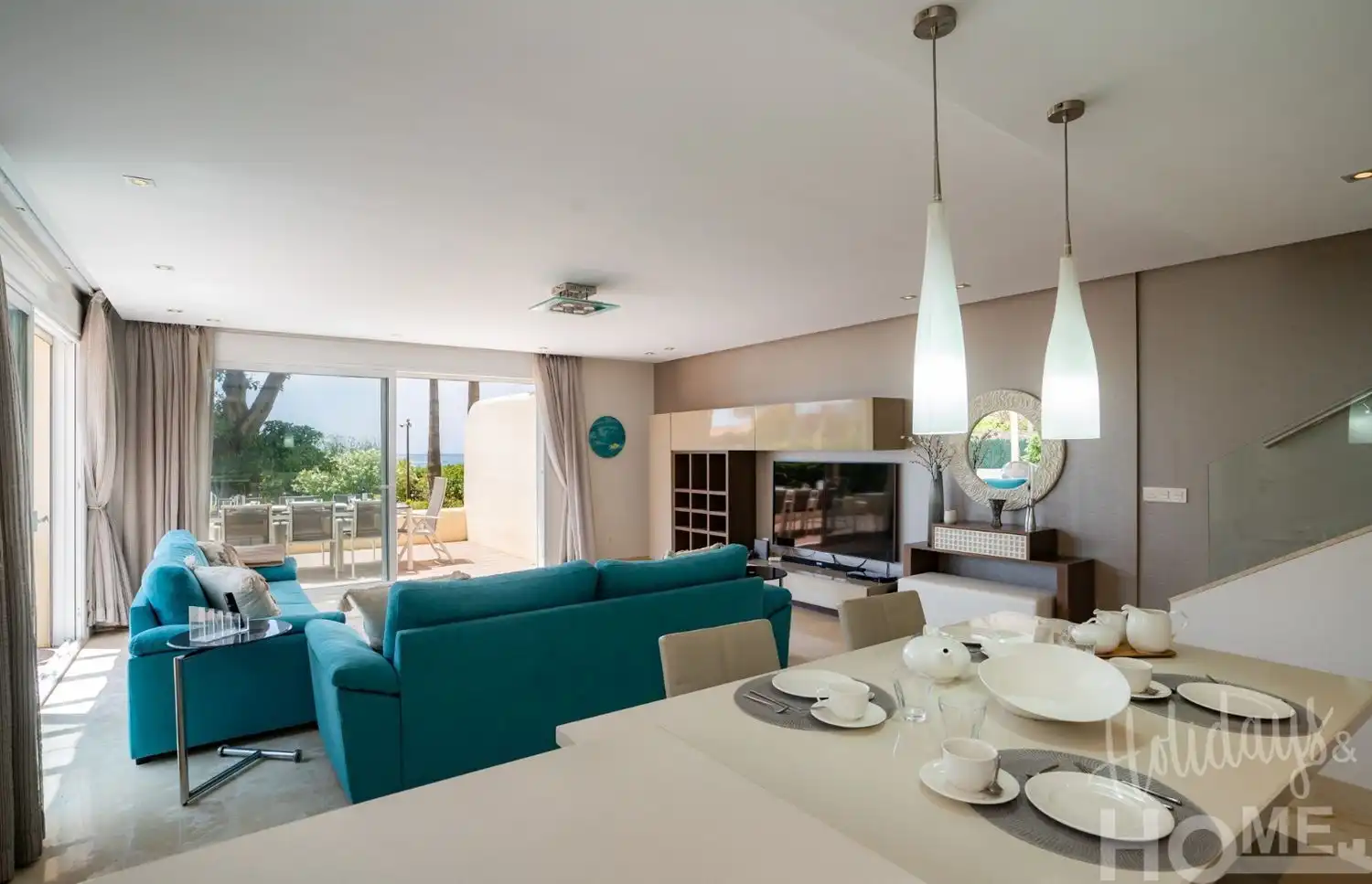 Sala d'estar de Pis de lloguer en Marbella amb Aire condicionat, Jardí privat i Terrassa