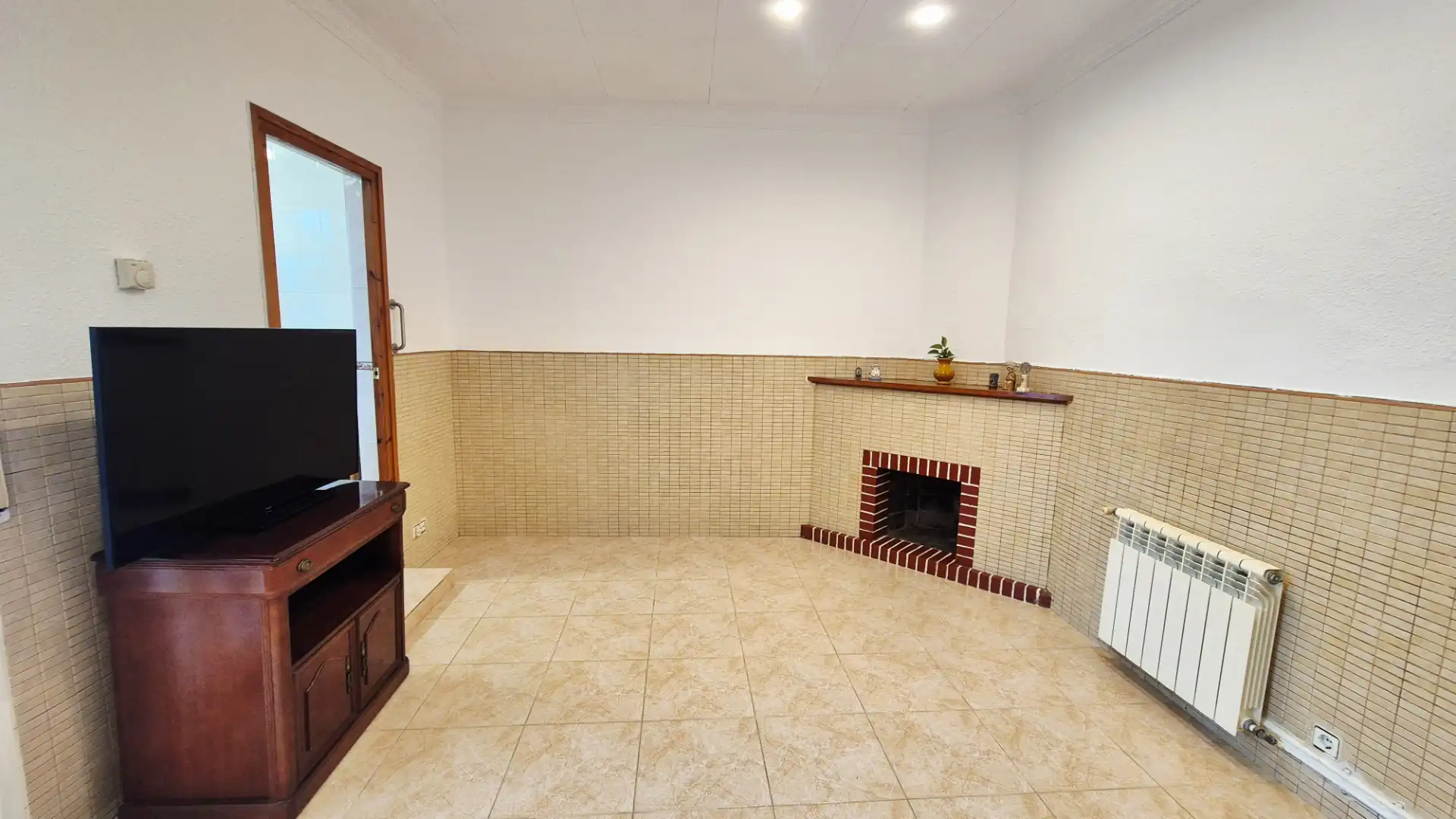 Sala d'estar de Casa o xalet en venda en Arenys de Mar amb Calefacció, Terrassa i Moblat