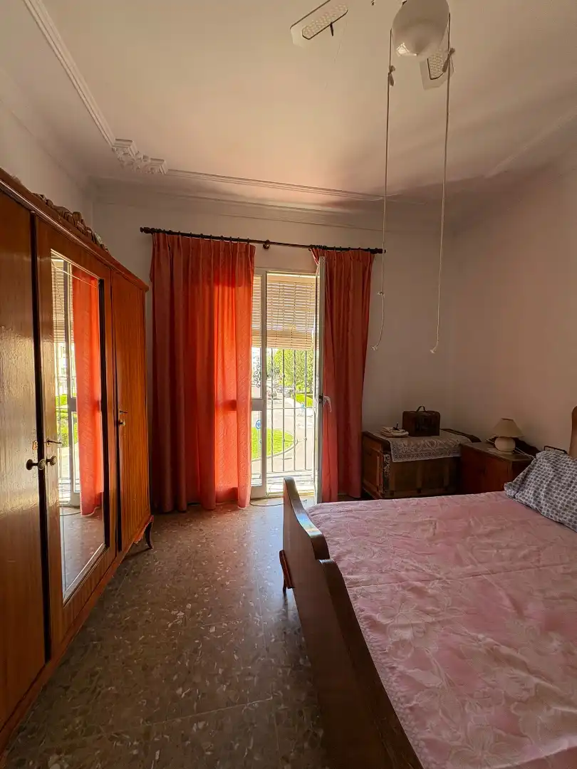Habitación de Casa adosada en venta en Carmona con Aire acondicionado, Terraza y Amueblado
