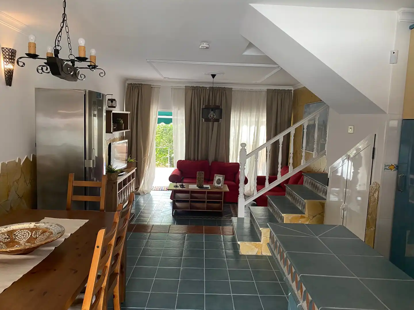 Sala d'estar de Casa adosada en venda en Mogán amb Aire condicionat, Terrassa i Traster