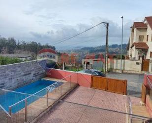 Vista exterior de Casa o xalet en venda en Sanxenxo amb Aire condicionat, Terrassa i Piscina