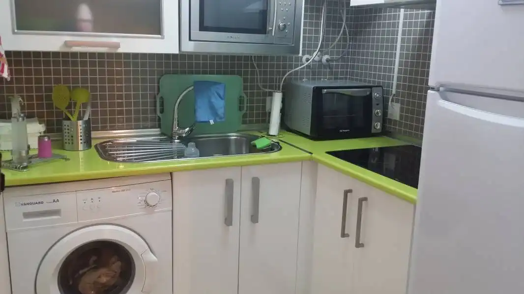 Küche von Wohnung zum Verkauf in Almería mit Klimaanlage und Möbliert