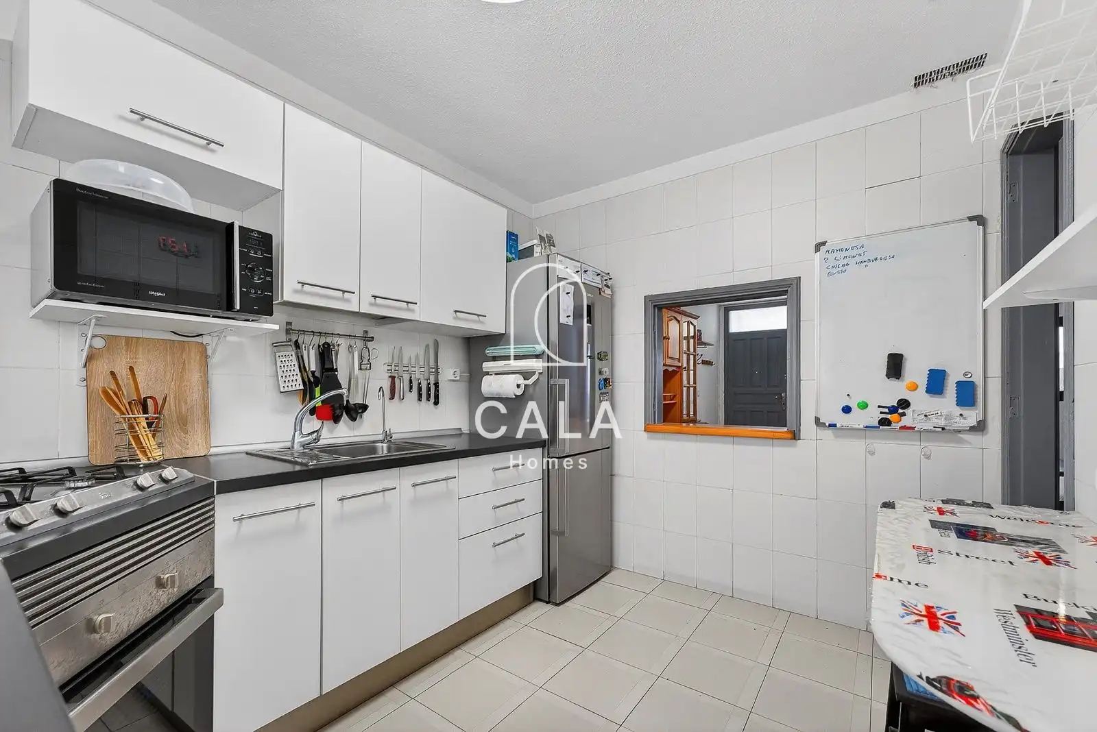 Cocina de Casa adosada en venta en Guía de Isora con Terraza, Trastero y Piscina