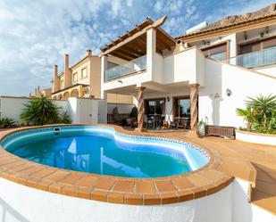 Exterior view of House or chalet for sale in Roquetas de Mar  with Air Conditioner, Terrace and Storage room