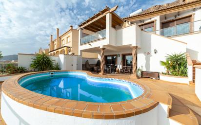 Vista exterior de Casa o xalet en venda en Roquetas de Mar amb Aire condicionat, Terrassa i Traster
