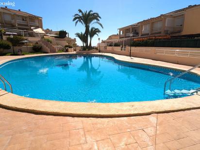 Piscina de Casa adosada en venda en Santa Pola amb Aire condicionat, Calefacció i Jardí privat