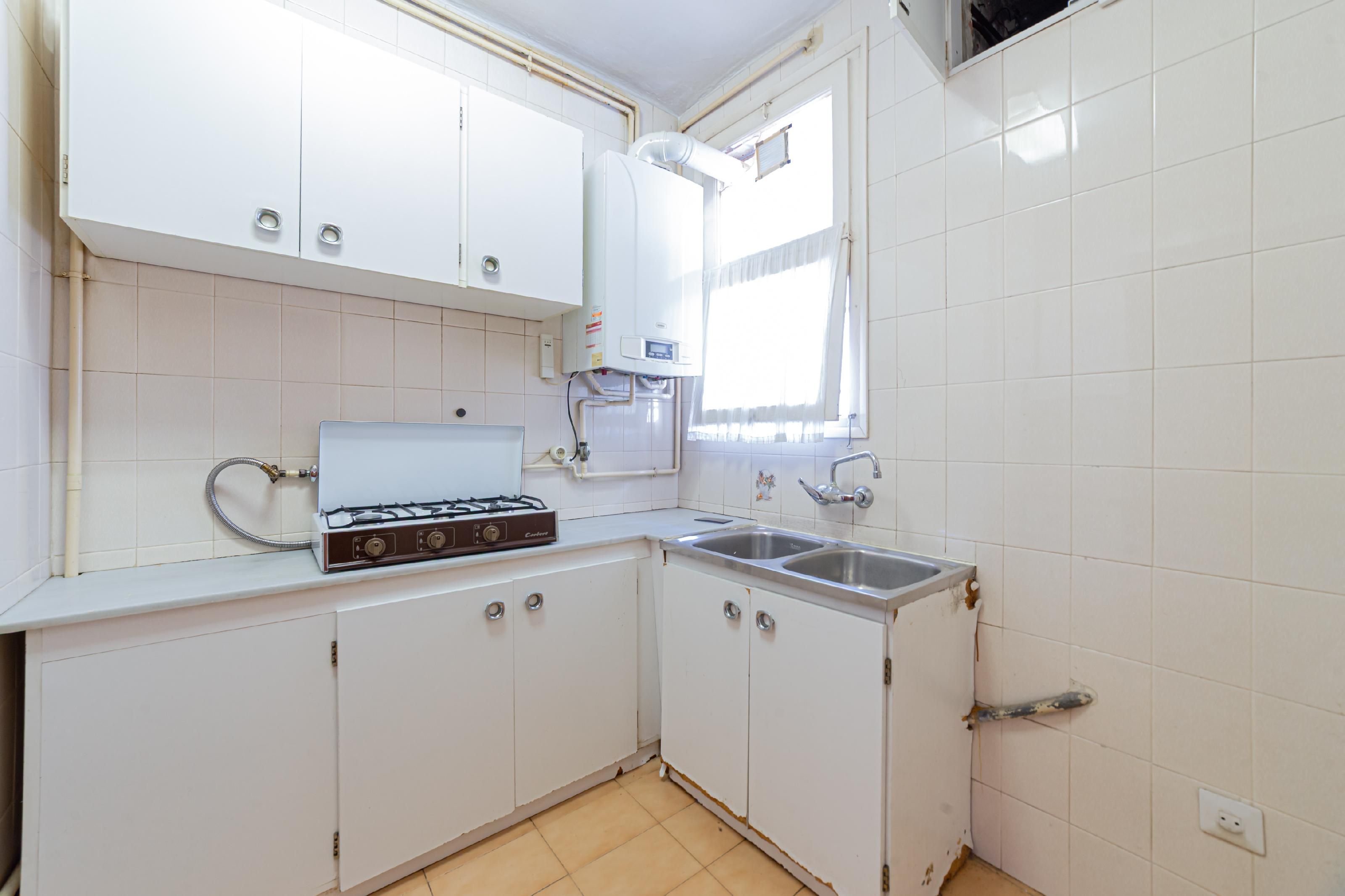 Kitchen of Attic for sale in  Barcelona Capital  with Air Conditioner and Heating