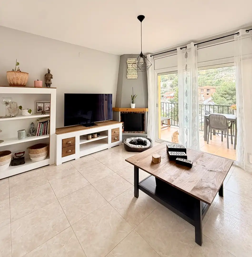 Sala de estar de Casa adosada en venta en Calafell con Calefacción, Jardín privado y Terraza