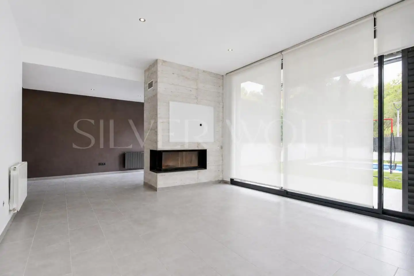 Sala de estar de Casa adosada de alquiler en Sant Pere de Ribes con Aire acondicionado, Calefacción y Jardín privado