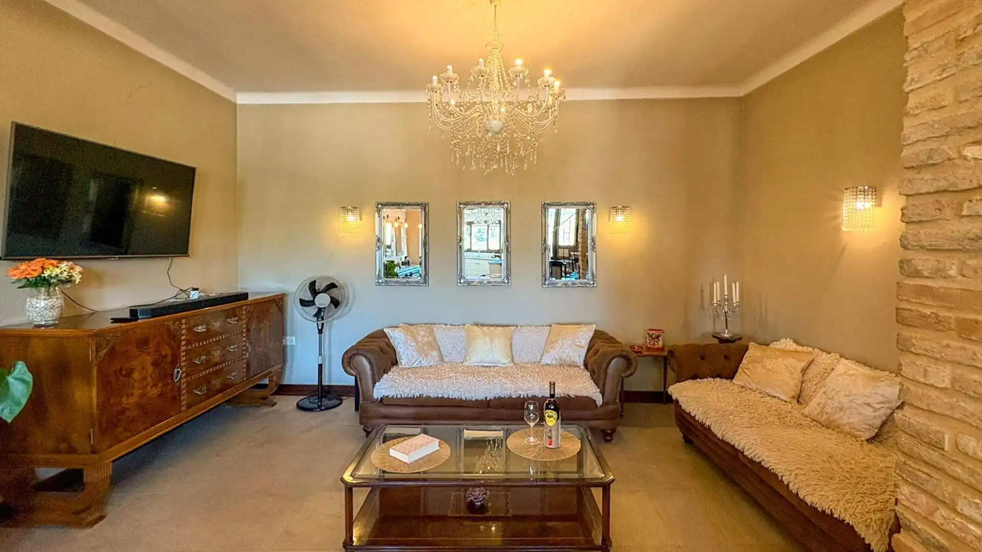 Sala de estar de Casa adosada en venta en Antequera con Calefacción, Terraza y Trastero