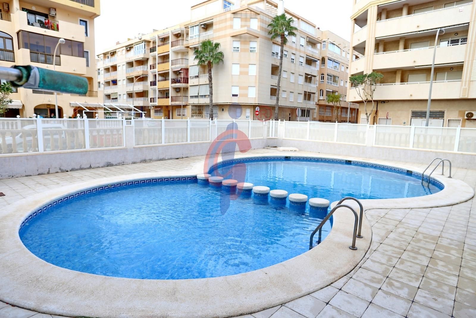 Swimming pool of Flat for sale in Guardamar del Segura  with Air Conditioner, Heating and Terrace