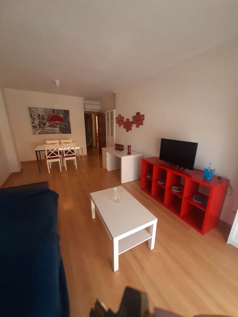 Sala d'estar de Pis de lloguer en Úbeda amb Aire condicionat i Moblat
