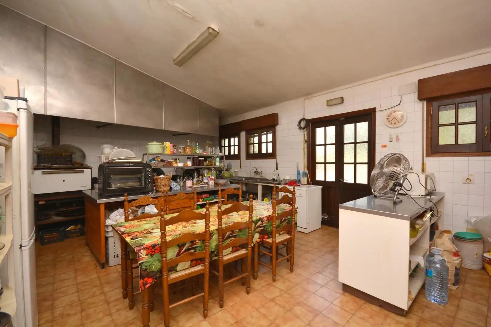 Cocina de Finca rústica en venta en Borrassà con Aire acondicionado, Calefacción y Jardín privado