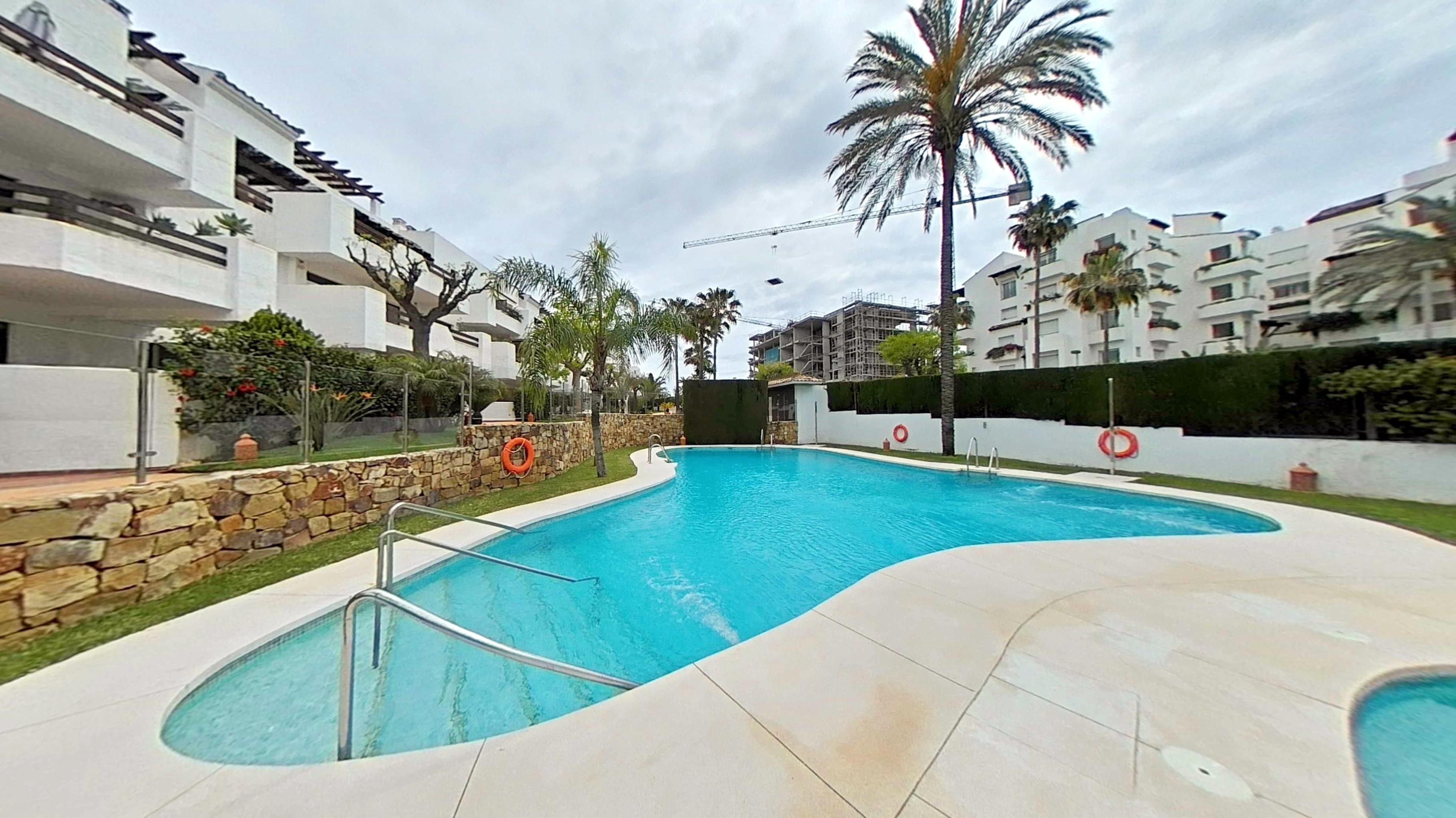 Swimming pool of Flat for sale in Estepona  with Air Conditioner, Private garden and Terrace