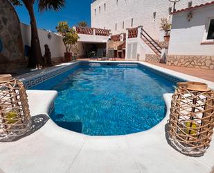 Piscina de Casa adosada en venda en Torrox amb Aire condicionat, Calefacció i Terrassa