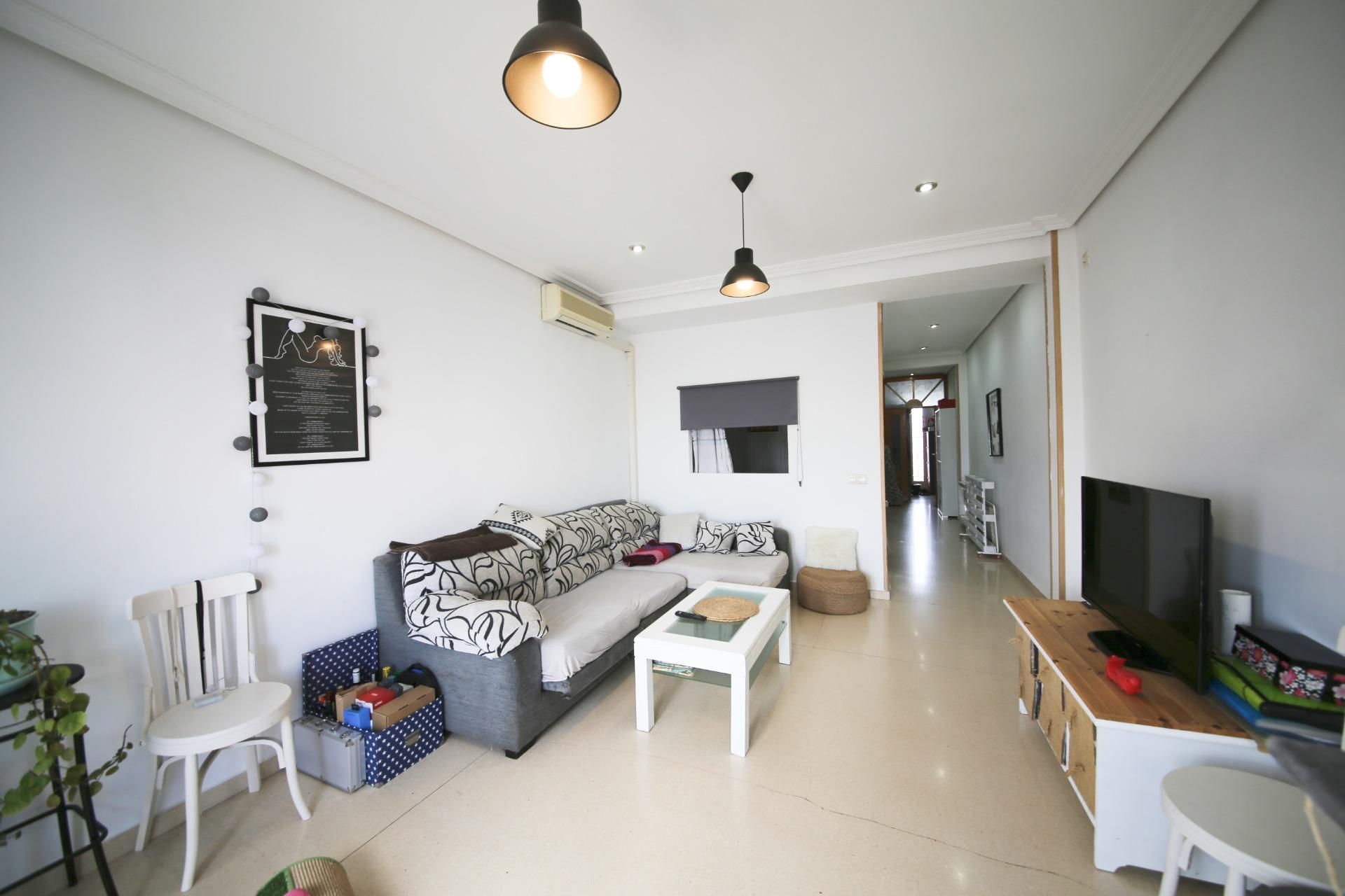 Sala de estar de Casa o chalet en venta en Tomelloso con Aire acondicionado, Jardín privado y Trastero