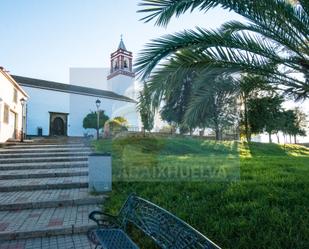 Exterior view of House or chalet for sale in Puebla de Guzmán  with Storage room and Alarm