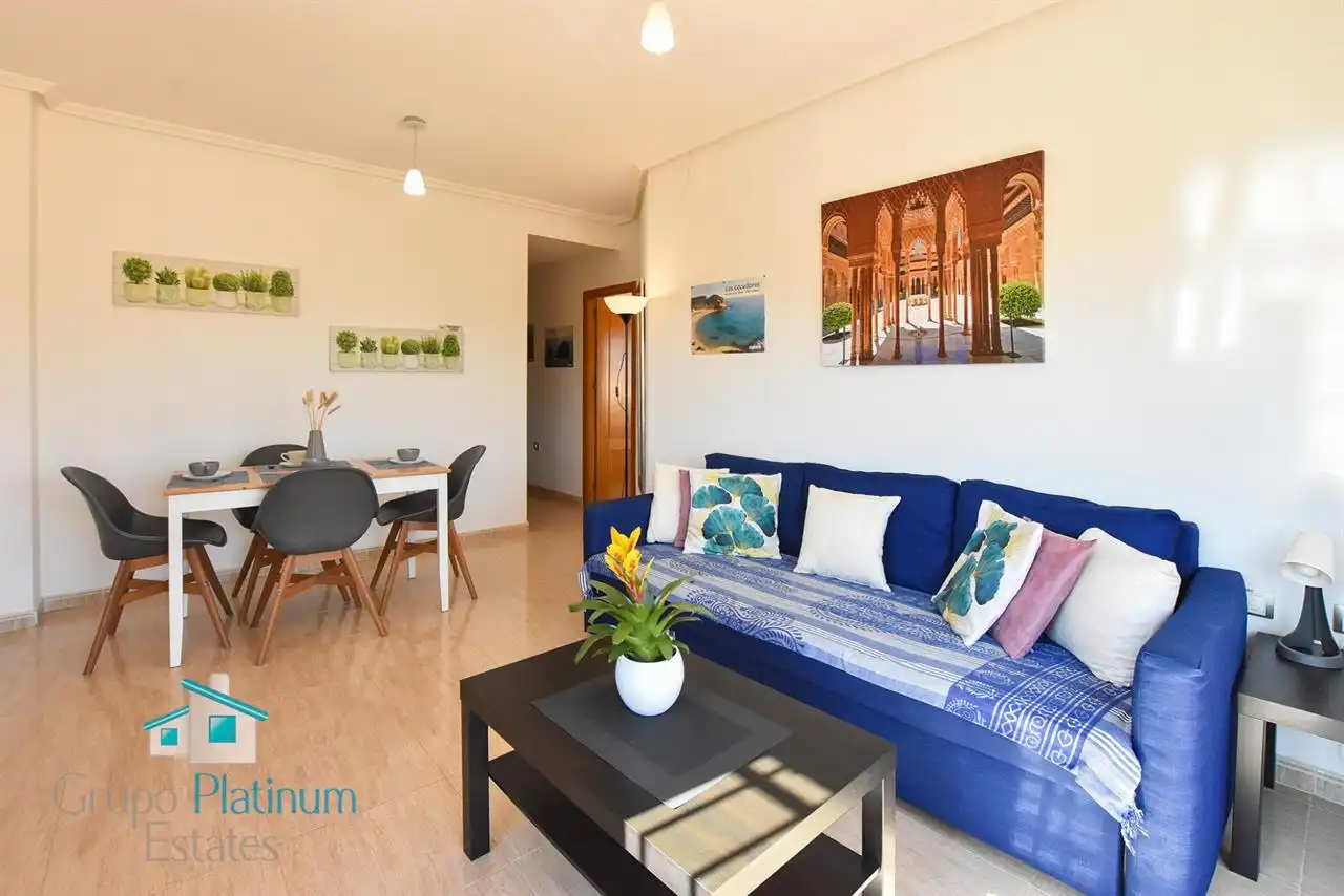 Sala d'estar de Apartament en venda en Pulpí amb Aire condicionat, Piscina i Moblat