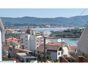 Vista exterior de Casa adosada en venda en Nigrán amb Aire condicionat, Jardí privat i Terrassa